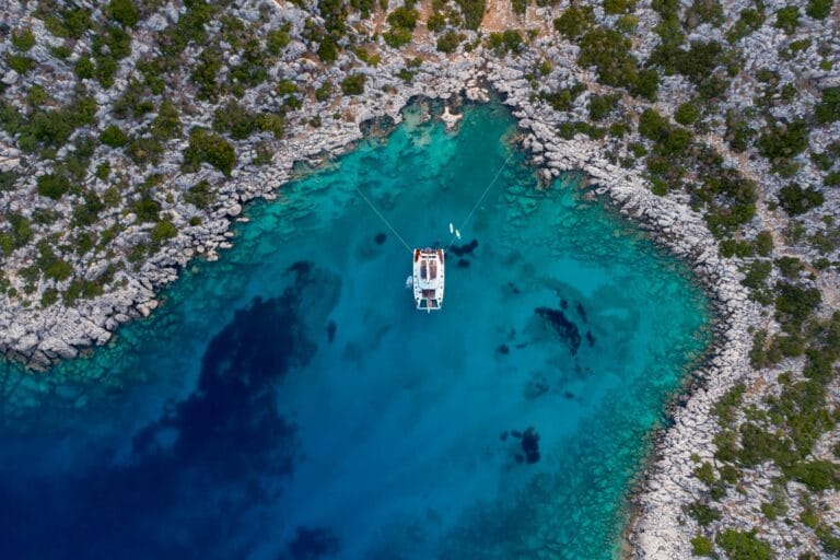 Luxury Catamaran Serenissima at anchor in a beautiful bay