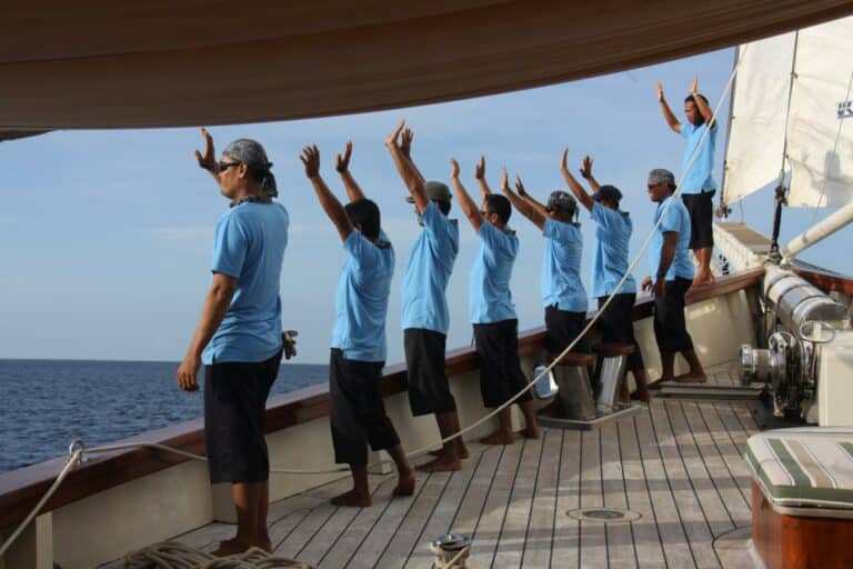 Crew of MUTIARA LAUT waiving at passengers charter Indonesia