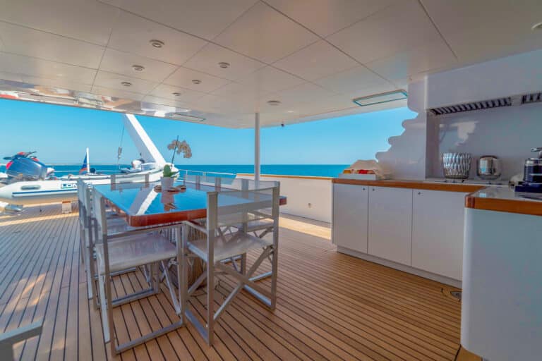 Motor Yacht Berzinc Aft Deck Table