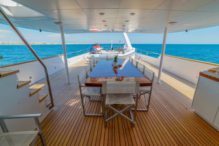 Motor Yacht Berzinc Aft Deck Dining Table